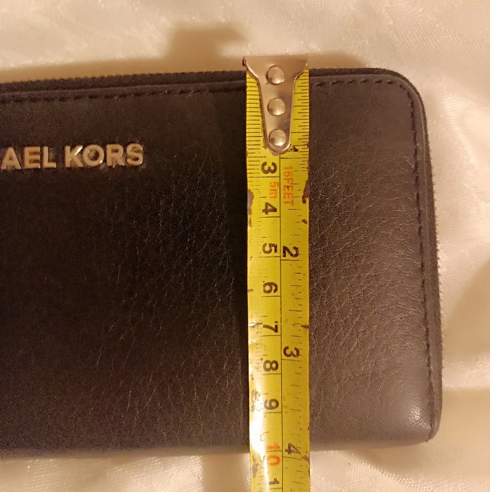 Michael Kors black pebbled leather accordion zippered wallet